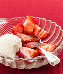 Image showing Fresh sliced strawberries in glass dish