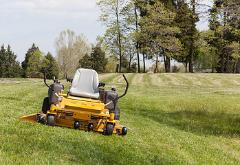 Image showing Zero turn lawn mower on turf with no driver