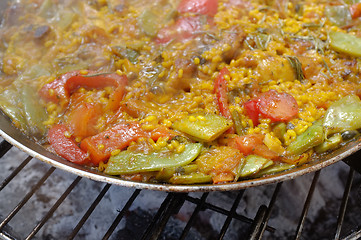 Image showing Finishing paella