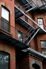 Image showing Old fire escape on brick building