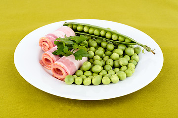 Image showing Fresh peas and ham rolls.