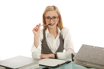 Image showing business woman with folder on desk workin isolated on white background