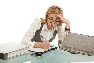 Image showing business woman with folder on desk workin isolated on white background