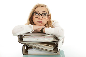 Image showing business woman with folder on desk workin isolated on white background