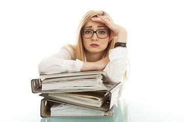 Image showing business woman with folder on desk workin isolated on white background