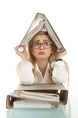 Image showing business woman with folder on desk workin isolated on white background