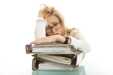 Image showing business woman with folder on desk workin isolated on white background