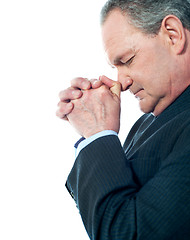 Image showing Portrait of matured businessman praying