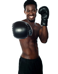 Image showing Shirtless african boxer ready to punch you