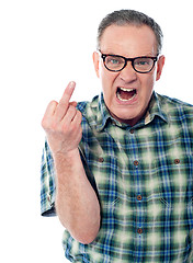 Image showing Image of a displeased man showing middle finger