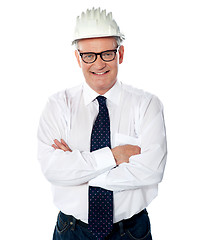 Image showing Portrait of happy senior foreman with hard hat