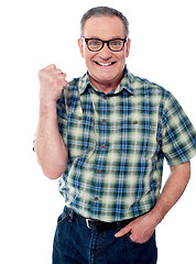 Image showing Excited elderly male dressed in casuals