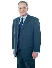 Image showing Senior business executive posing in front of camera