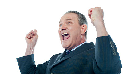 Image showing Elder businessman in a victory pose