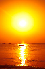 Image showing tropical island sunset boat