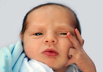 Image showing Thinking baby on his first day