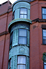 Image showing ornate rounded bay windows one