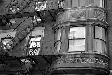 Image showing ornate rounded bay windows black and white one