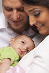 Image showing Mixed Race Young Family with Newborn Baby