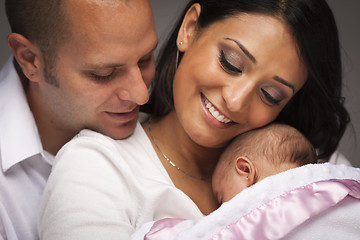 Image showing Mixed Race Young Family with Newborn Baby