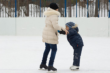 Image showing Helping to skates. First try