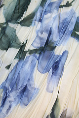 Image showing Water colour pattern from blue flowers on a fabric for backgroun