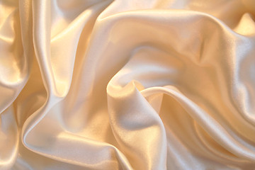 Image showing Smooth elegant golden silk as background