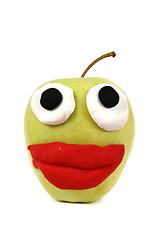 Image showing green apple with plasticine smile