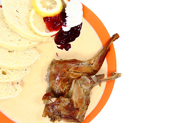 Image showing rabbit legs and carrot sauce 