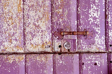 Image showing Old painted, crumbled door.