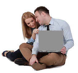 Image showing Young couple working on a laptop