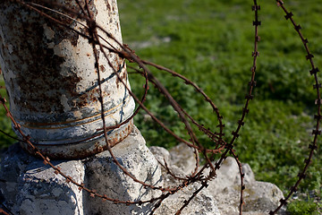 Image showing Robben Island barbed wire post