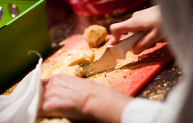 Image showing Slicing French bread