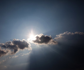 Image showing Sun shining from behind clouds