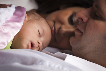 Image showing Mixed Race Young Family with Newborn Baby