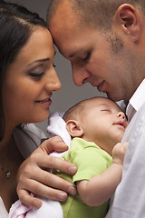 Image showing Mixed Race Young Family with Newborn Baby