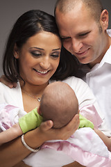 Image showing Mixed Race Young Family with Newborn Baby