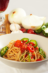 Image showing spicy italian pasta tomato and chili peppers sauce