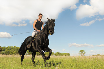 Image showing young man and horse