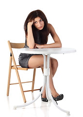 Image showing Girl sitting on a chair