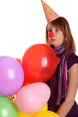 Image showing Sad girl with colored baloons