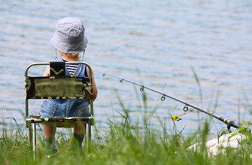 Image showing Little boy with fishing rod