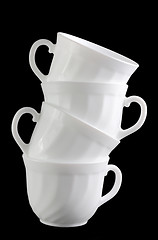 Image showing Pile of white shiny cups