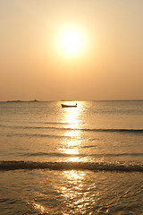 Image showing tropical island sunset boat