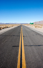 Image showing long highway through desert