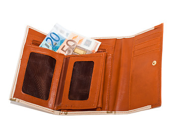 Image showing Wallet with monetary denominations on a white background