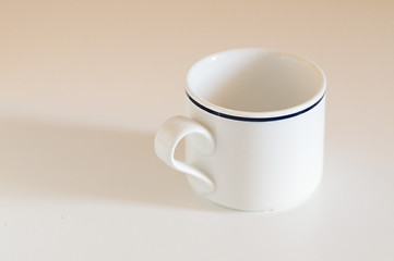 Image showing White breakfast cup over table