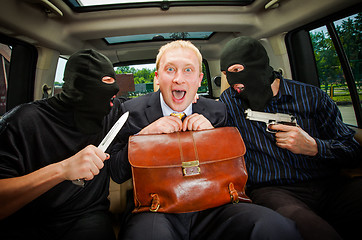 Image showing businessman grasped in hostages.