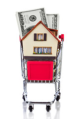 Image showing shopping cart and house