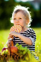 Image showing little boy with a sweet